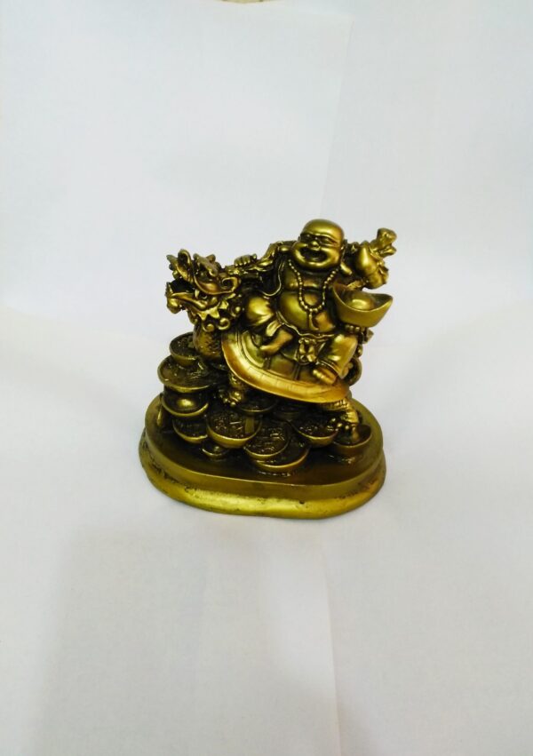 laughing buddha on dragon tortoise