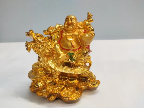 laughing buddha on dragon tortoise